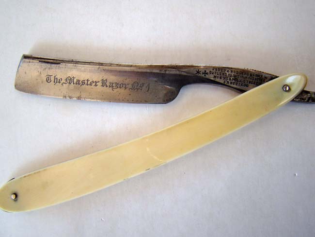 A fine cased set of seven straight edge razors with ivory and bone handles in a brass bound walnut box circa 1850 — image 5